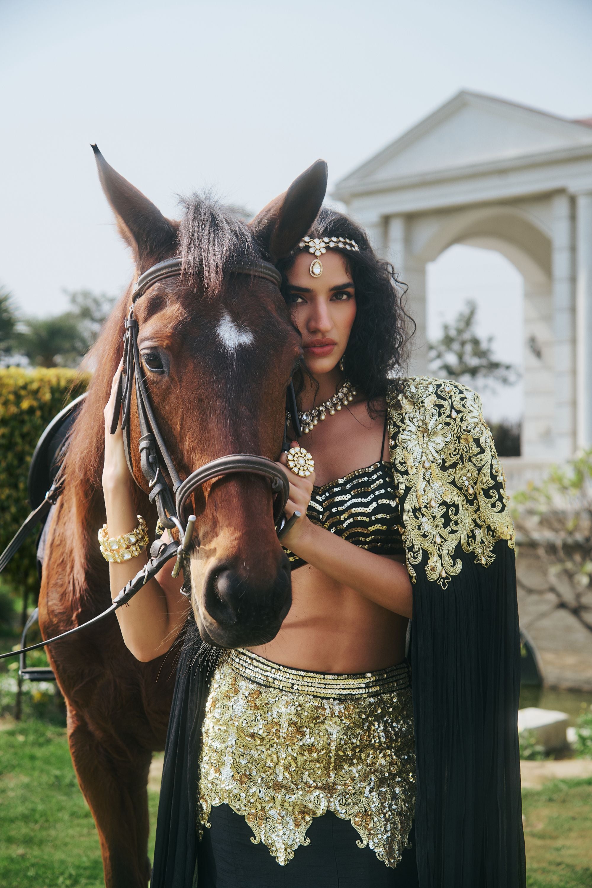 Hand Embelished and Dori-work Cape with Bustier and Fishcut Lehenga