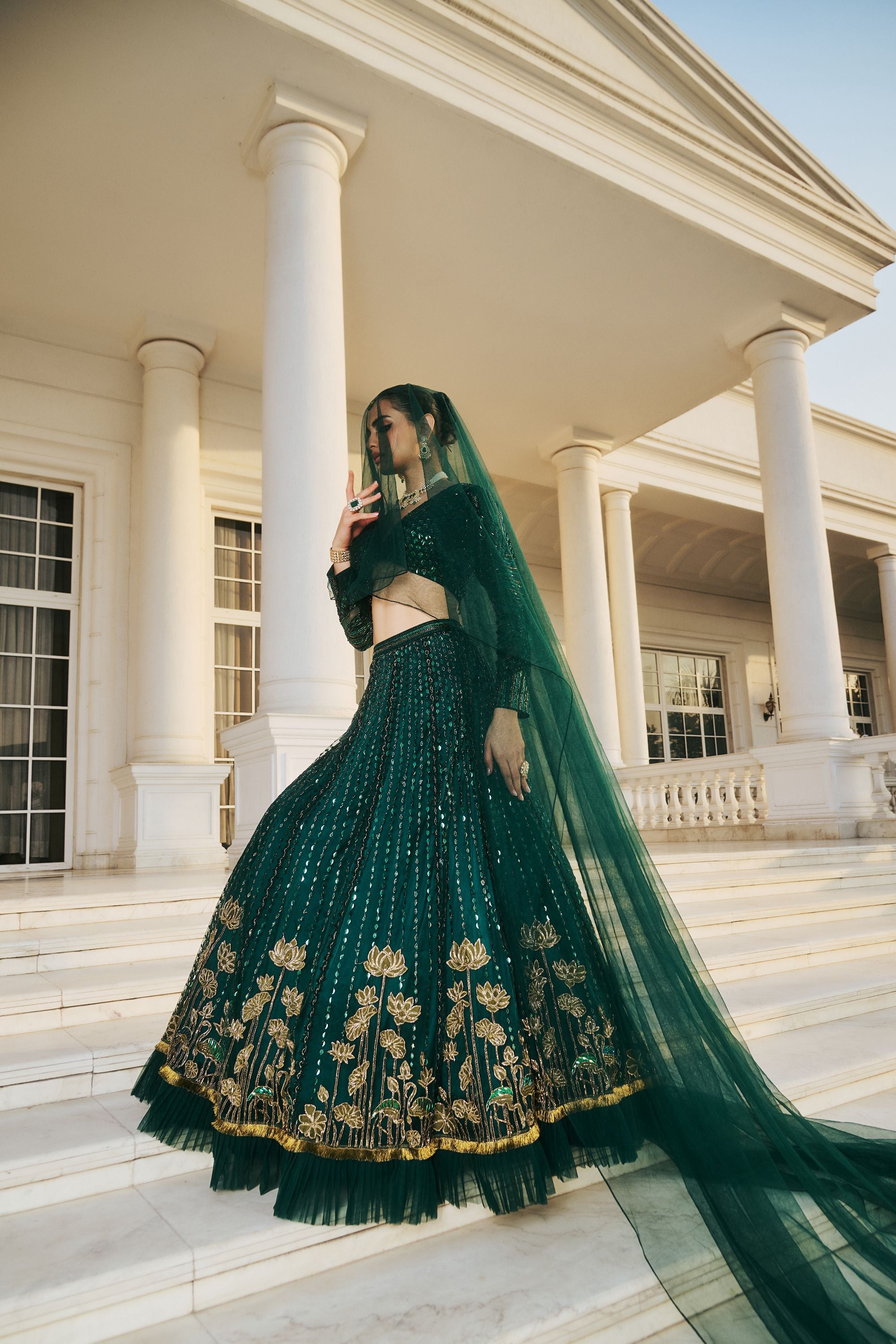 Emerald Green Hand Embroidered Lehenga with Rich Embelishments