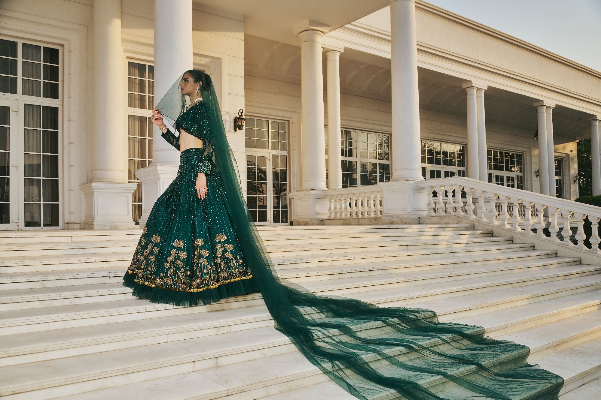Emerald Green Hand Embroidered Lehenga with Rich Embelishments