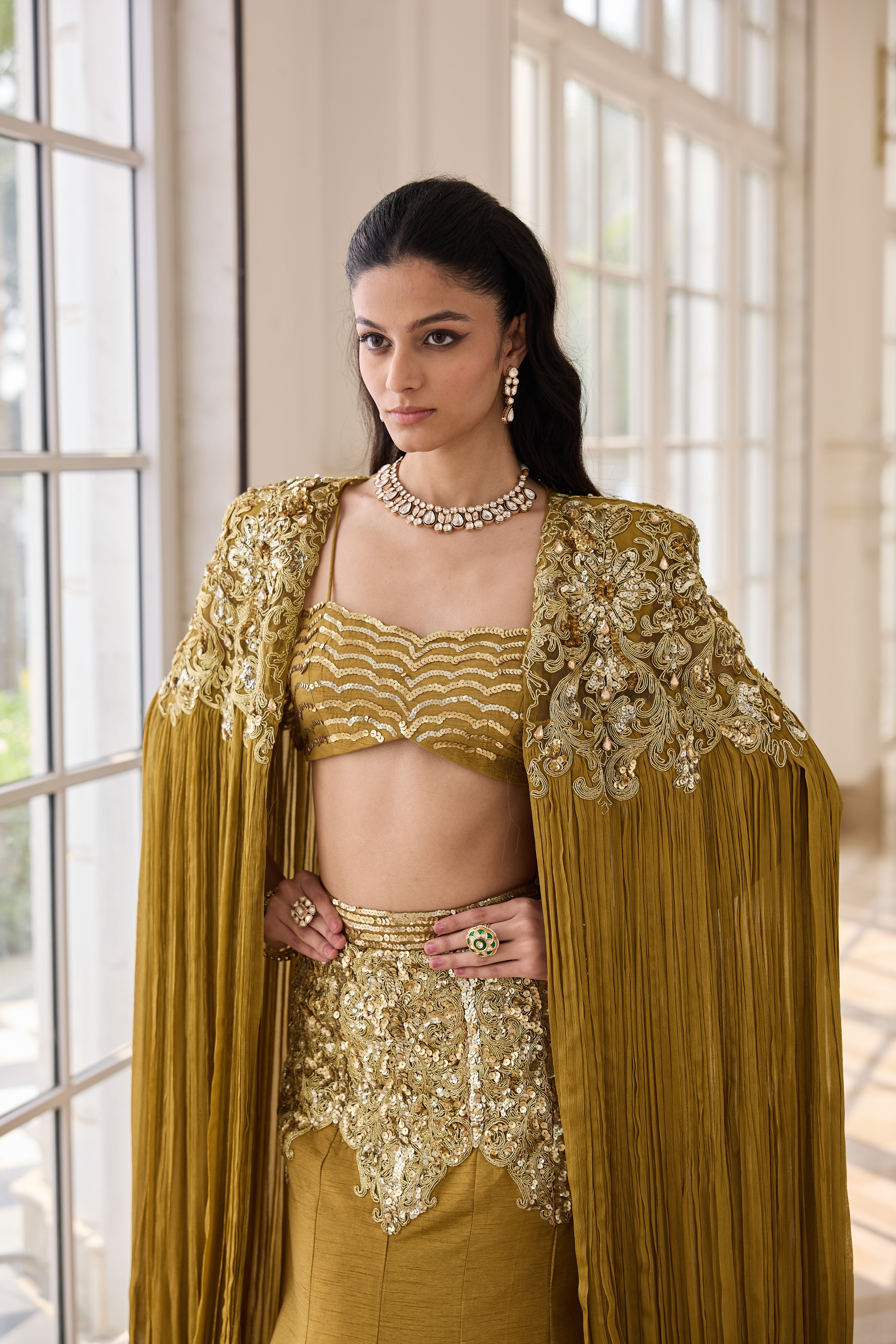 Hand Embelished and Dori-work Cape with Bustier and Fishcut Lehenga