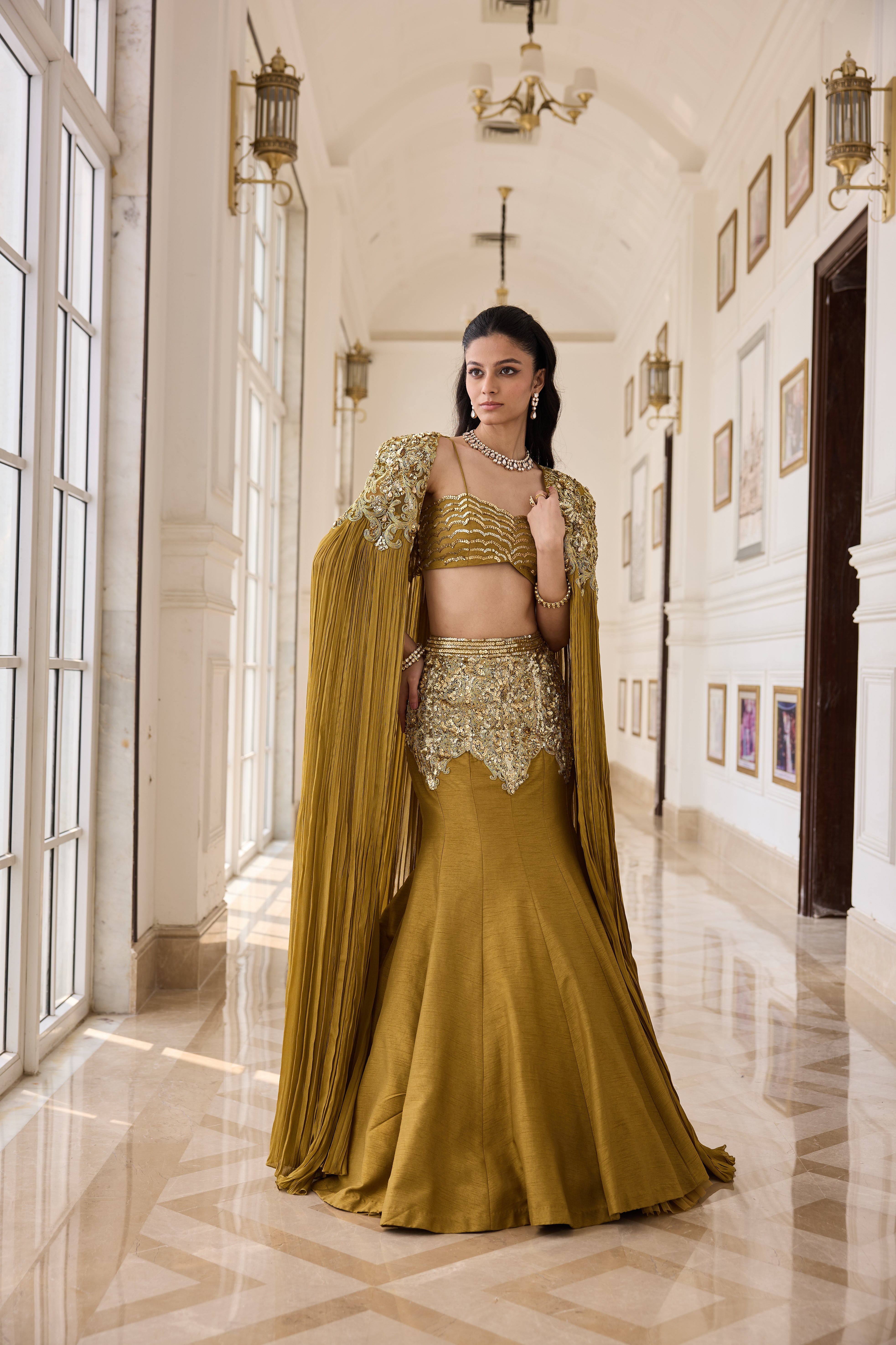 Hand Embelished and Dori-work Cape with Bustier and Fishcut Lehenga