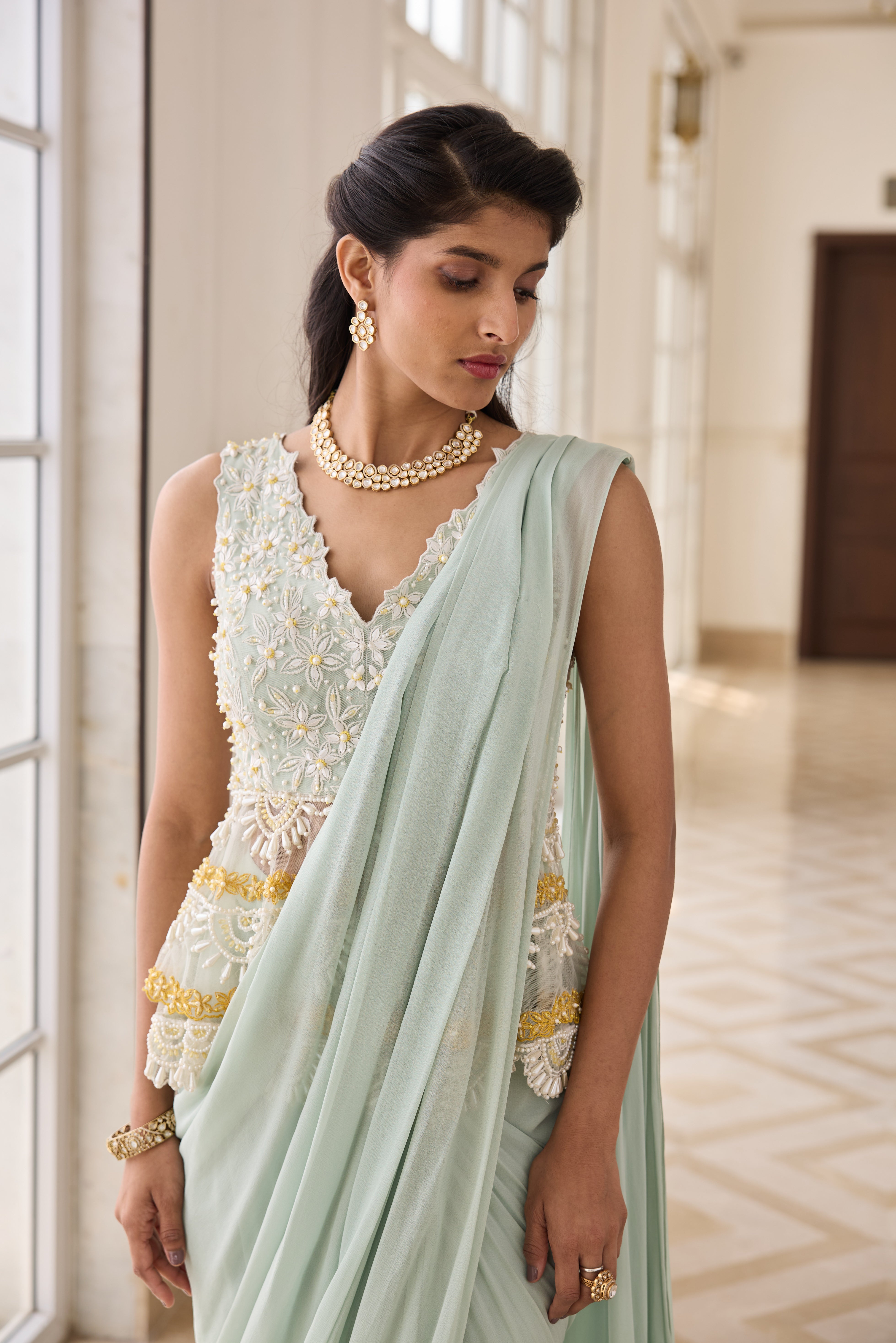 Hand Embroirderd Pearl Peplum with Drape Saree