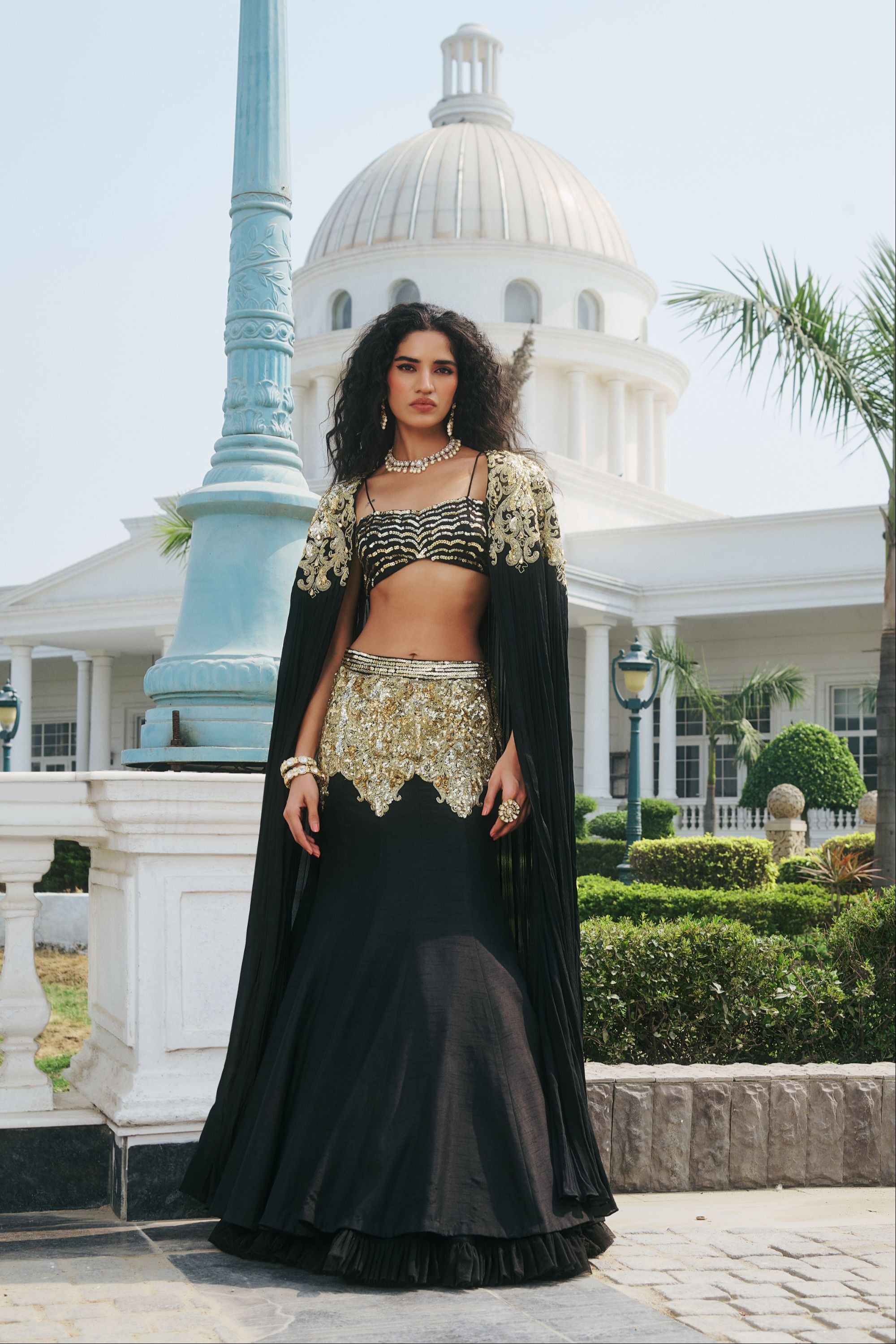 Hand Embelished and Dori-work Cape with Bustier and Fishcut Lehenga