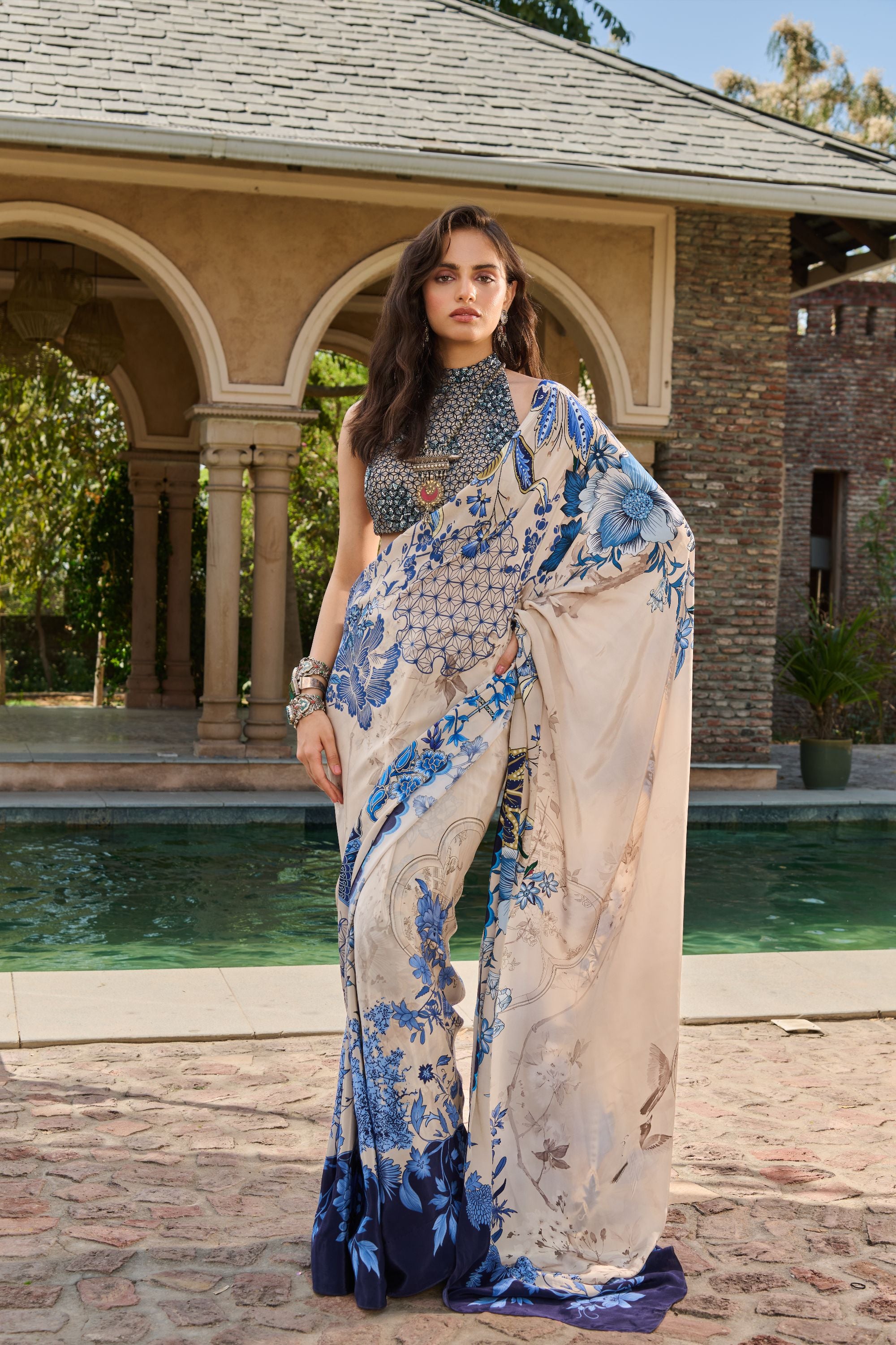 Hand Embelished Halter Blouse with Printed Saree and Petticoat