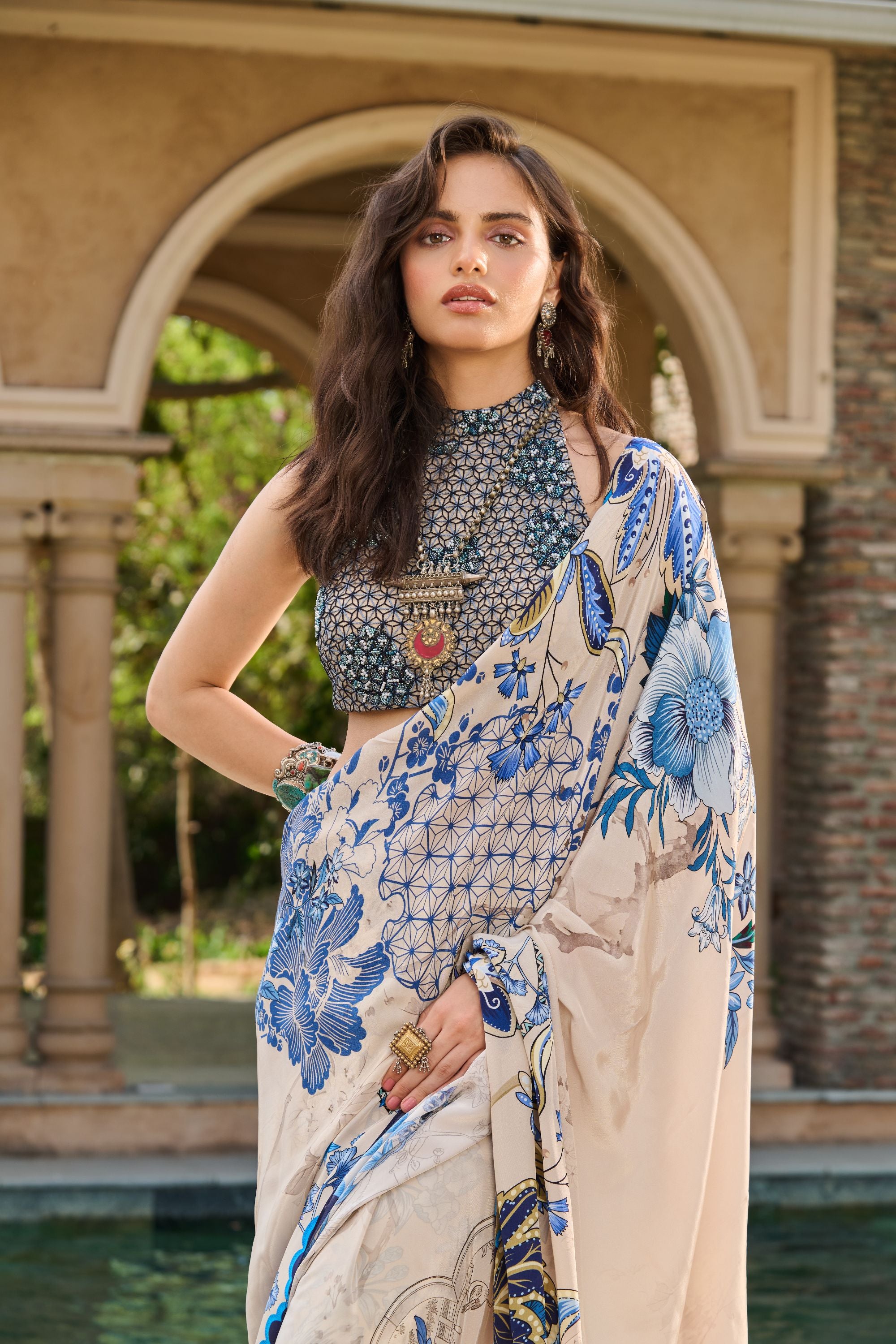 Hand Embelished Halter Blouse with Printed Saree and Petticoat