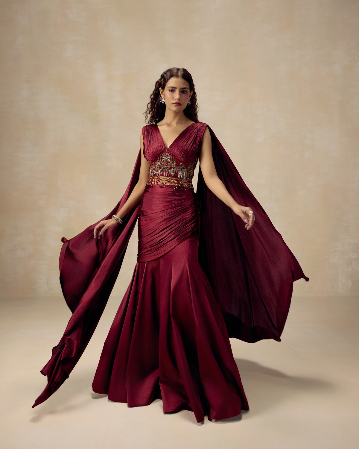 Burgundy textured satin draped lehenga with pleated bustier and Persian embroidery in stones and crystals — RINESSA