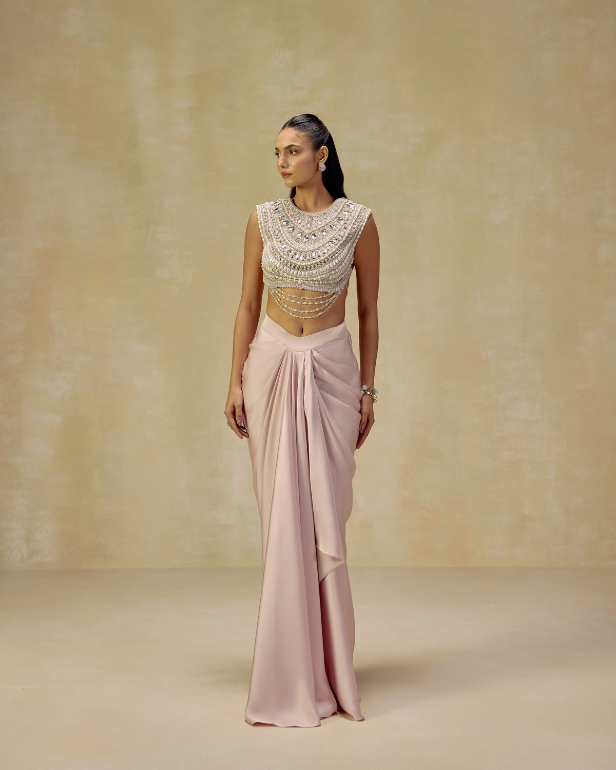 Pink silk satin backless blouse jewelled with pearls and stones, hand-strung pearl chains and draped skirt — RINESSA