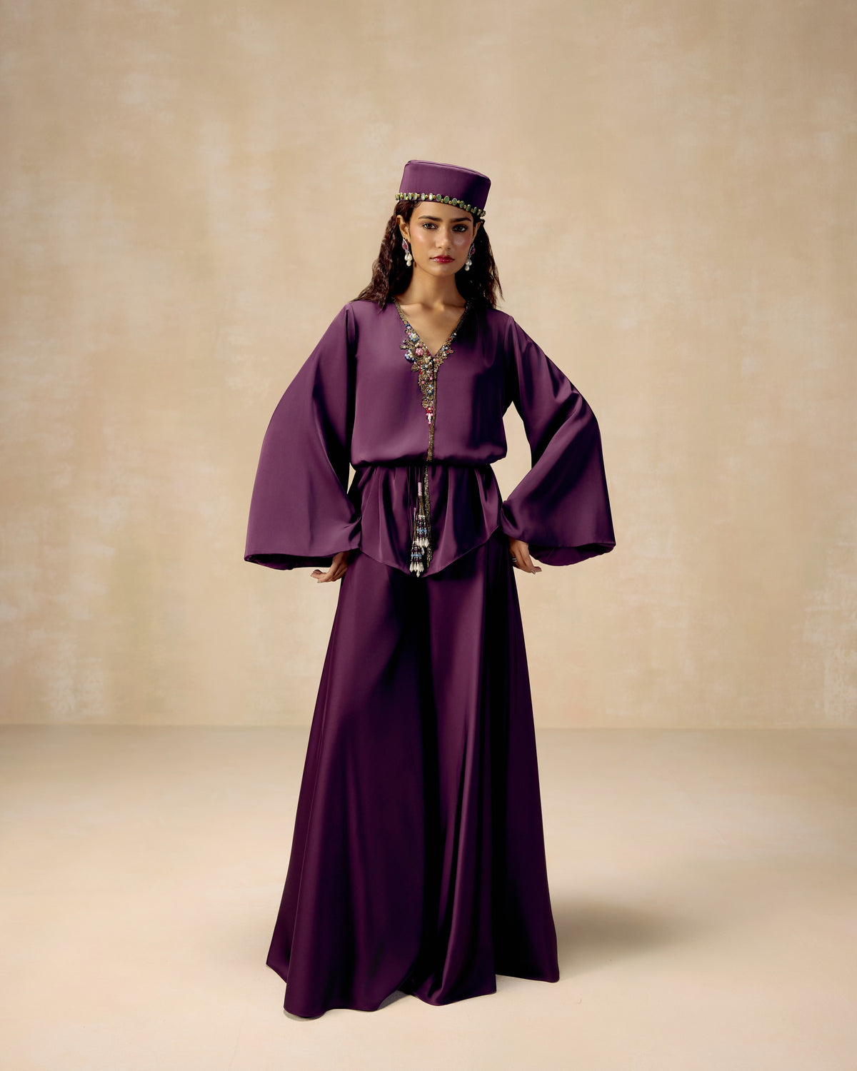 Purple silk satin sharara set with peplum top, crystal embroidery down the front and tassels — RINESSA