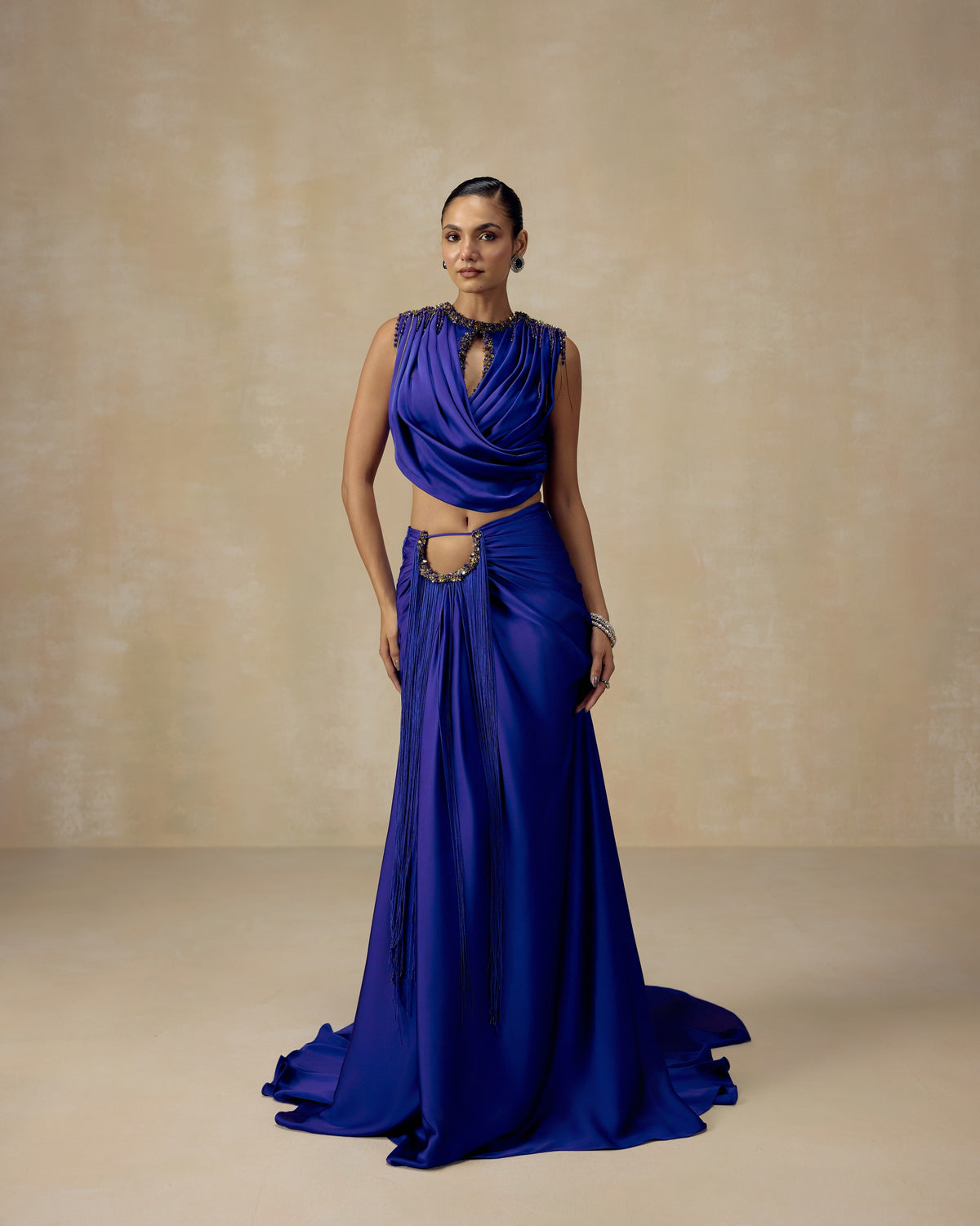 Royal blue silk satin lehenga with draped corset blouse, waist cut-out, fringe and trailing skirt — RINESSA