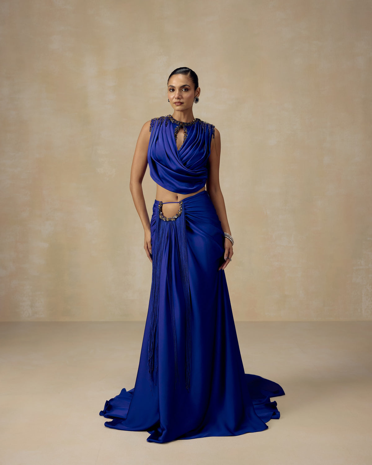 Royal blue silk satin lehenga with draped corset blouse, waist cut-out, fringe and trailing skirt — RINESSA