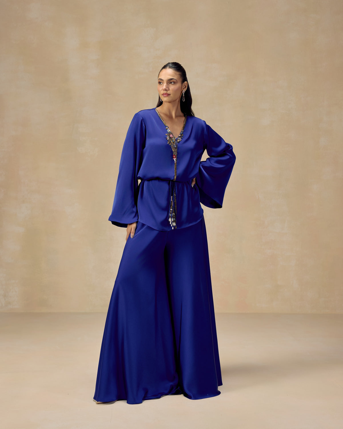 Royal blue silk satin peplum top with crystal embroidery and tassels, with sharara trousers — RINESSA