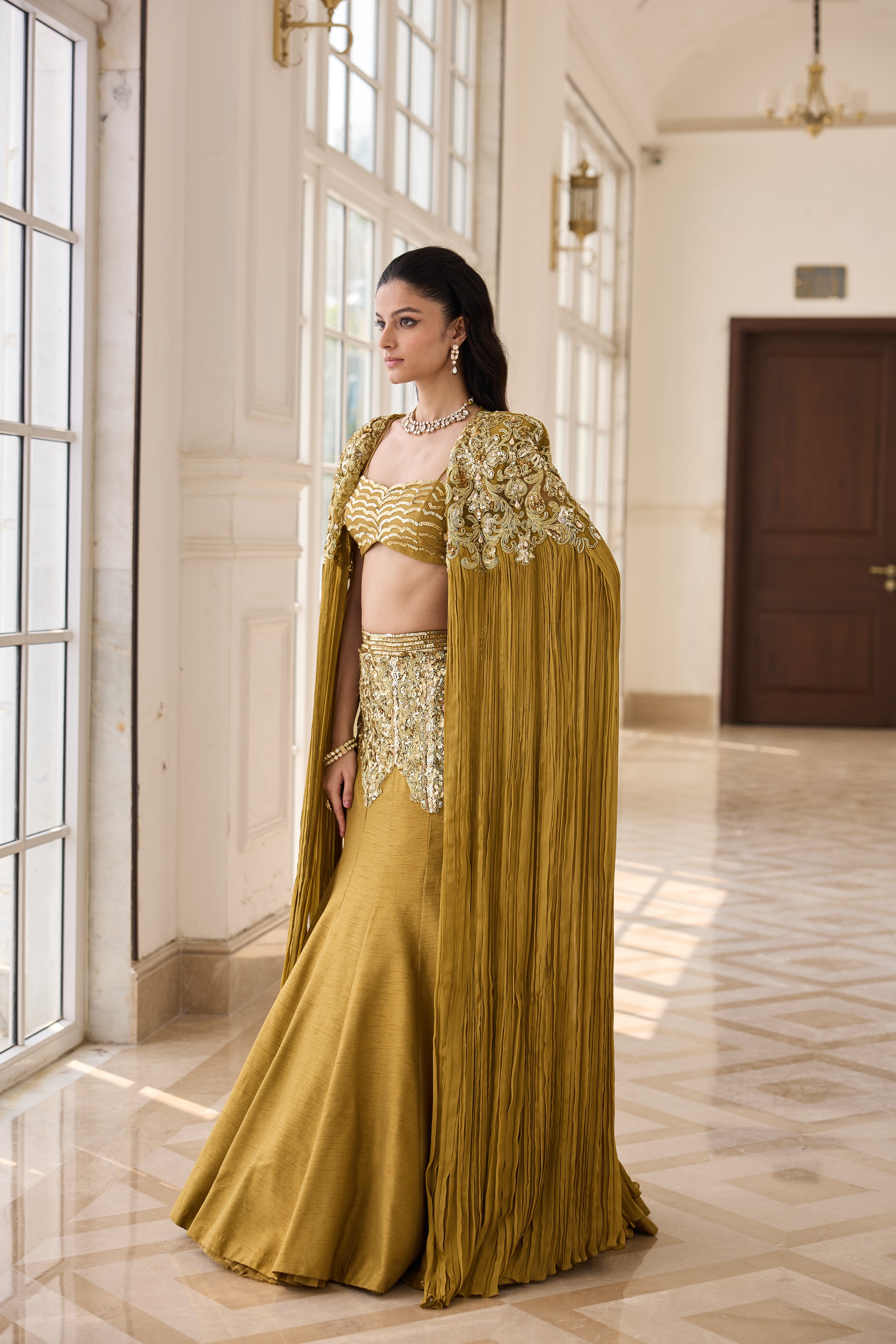 Hand Embroidered and Dori-work Cape with Bustier and Fishcut Lehenga