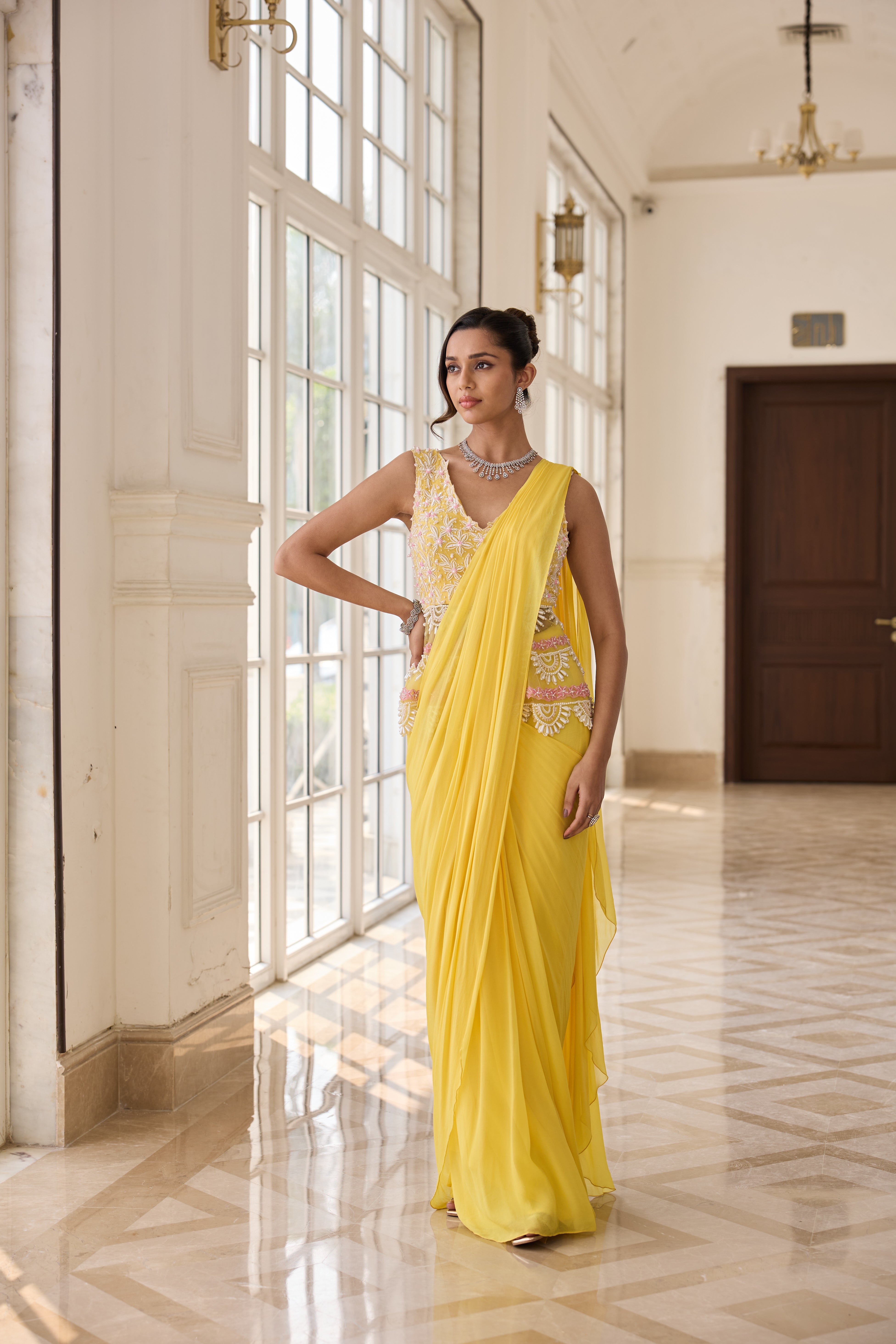 Hand Embroirderd Pearl Peplum with Drape Saree