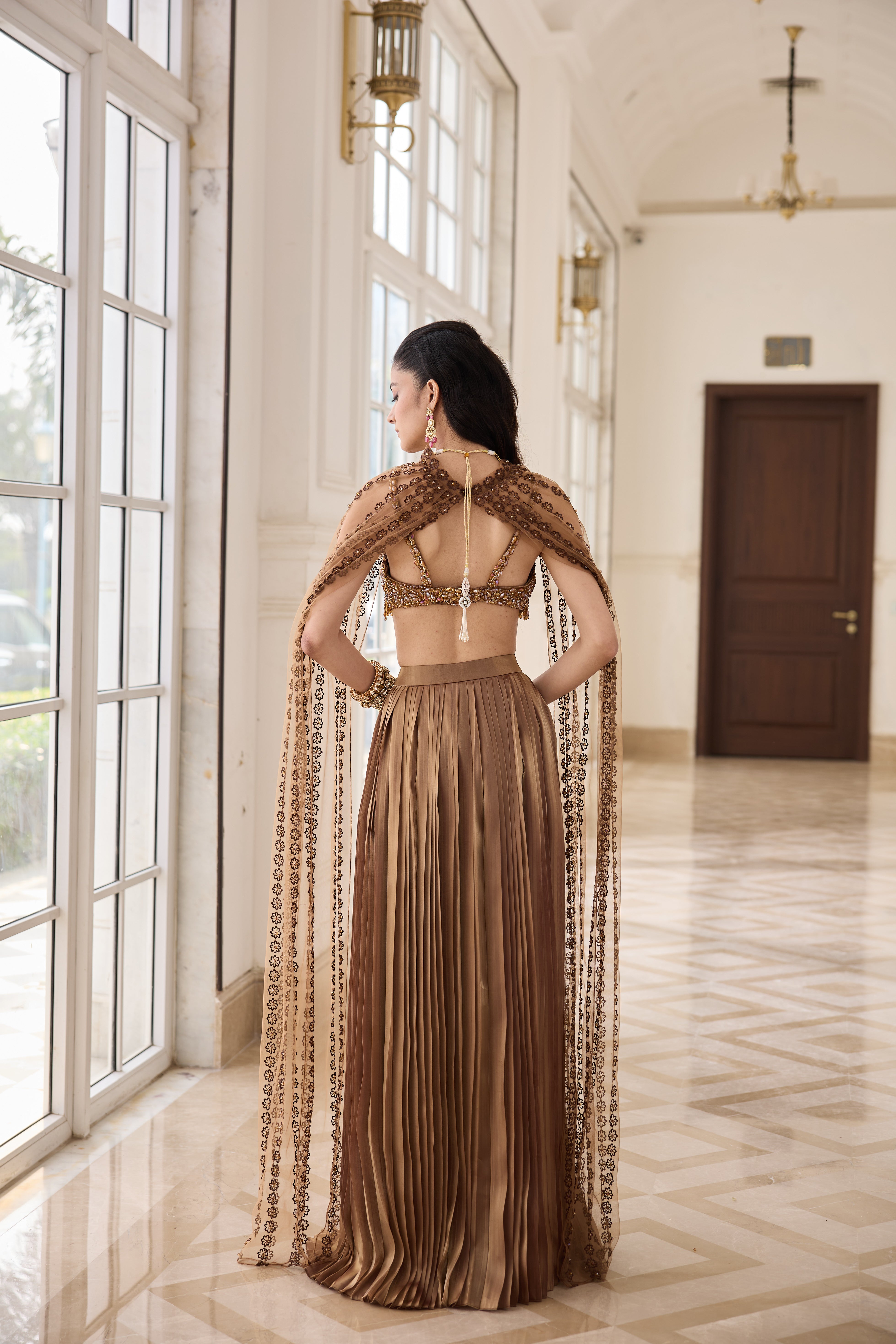 Gold Hand Embroidered Bustier with Butterfly wing and Pleated Skirt